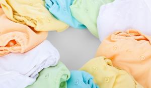 Image: colorful array of cloth diapers. Topic: Go Green With Cloth Diapers