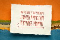 Paper-looking sign that says: Our History is Our Strength Jewish American Heritage Month