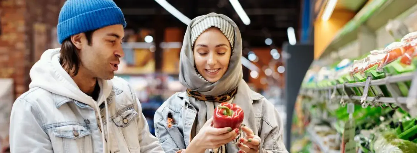 couple buying produce