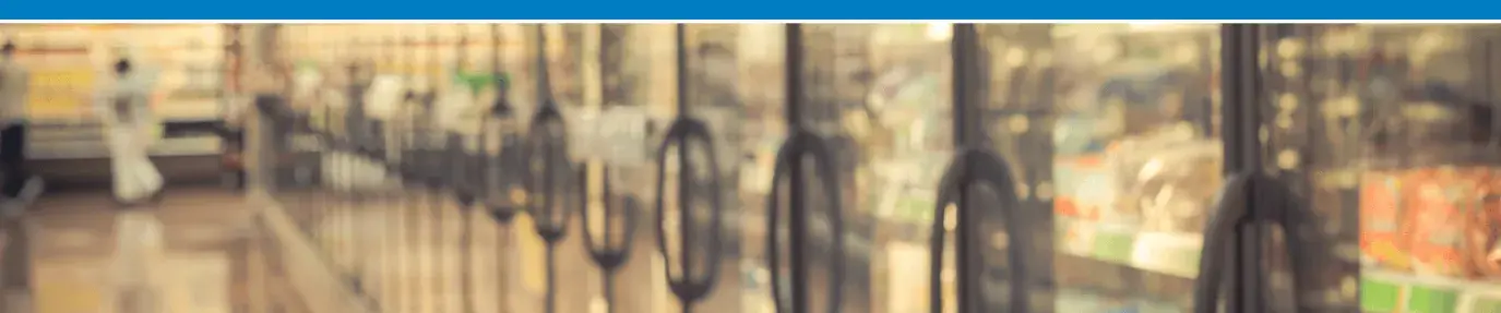 Image of supermarket coolers. Text: Walmart freezers leak gases that escalate climate change. Tell them to cool it!