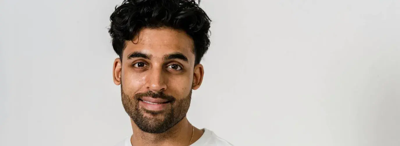 Man putting his vote into a ballot box