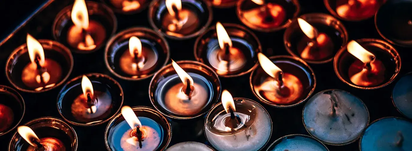 Image: lit and unlit nontoxic candles beeswax candles